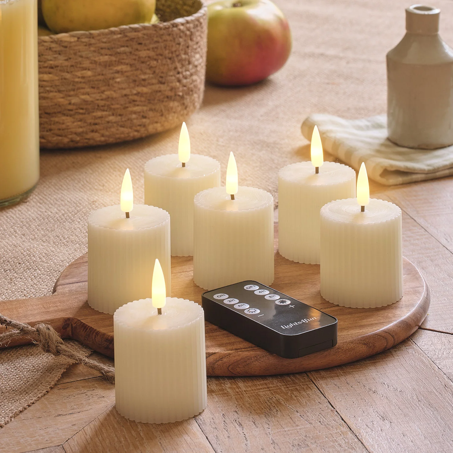 6 TruGlow® Ivory LED Votive Candles with Remote Control - Image 4