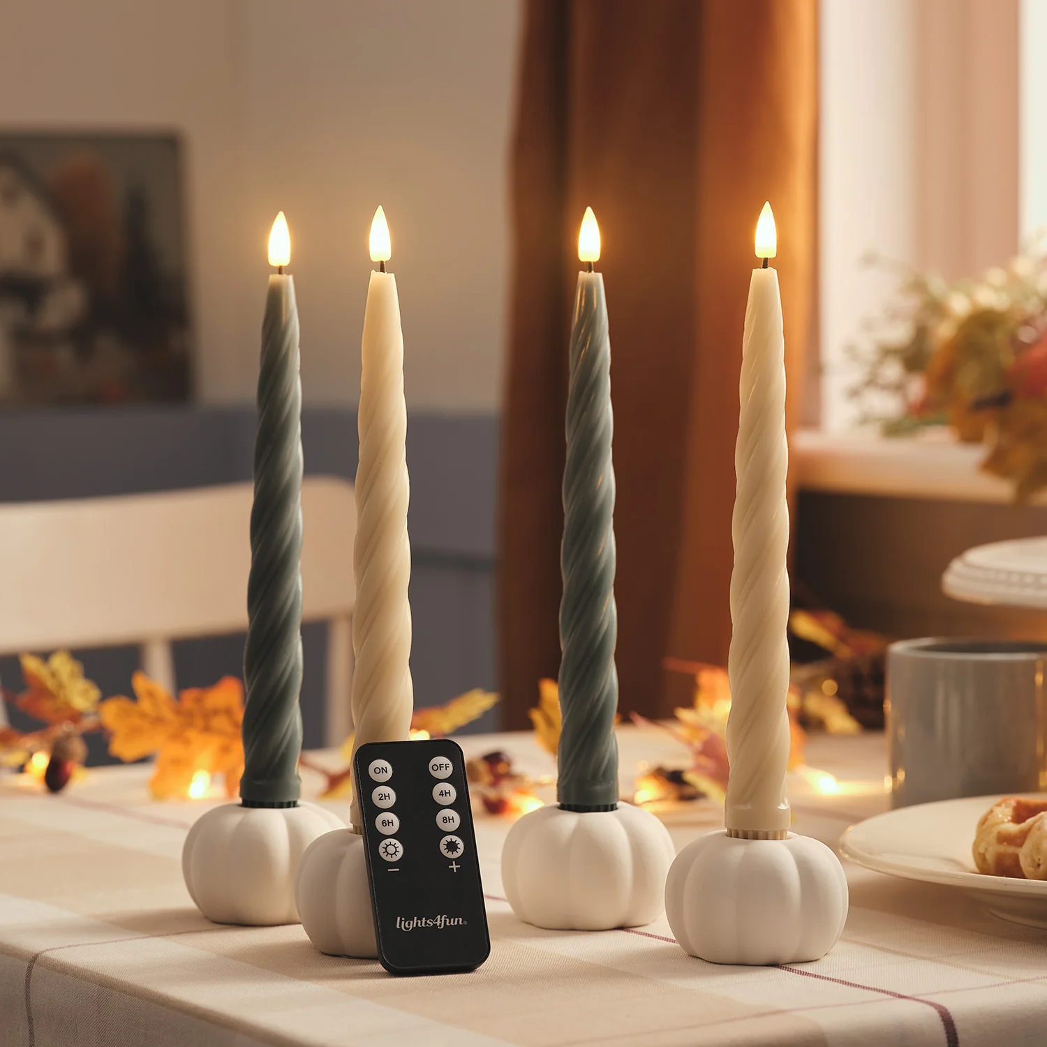 Set of 4 TruGlow® Cream and Dark Green Twisted LED Taper Candles and White Ceramic Pumpkin Taper Candle Holders - Image 5
